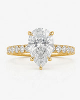 Yellow gold pear shaped moissanite ring for a romantic and refined engagement look | SARATTI