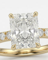 Yellow gold radiant moissanite engagement ring for meaningful proposal moments | SARATTI