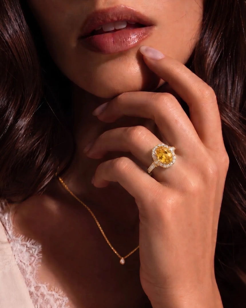 Yellow sapphire and diamond engagement ring with halo design in yellow gold | SARATTI