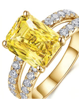 Yellow sapphire and diamond gift ring with split shank in 18K yellow gold | SARATTI