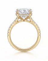 Adriana 1 carat F-colour oval natural diamond hidden halo ring in 18K yellow gold, side profile showing hidden halo and raised gallery | SARATTI