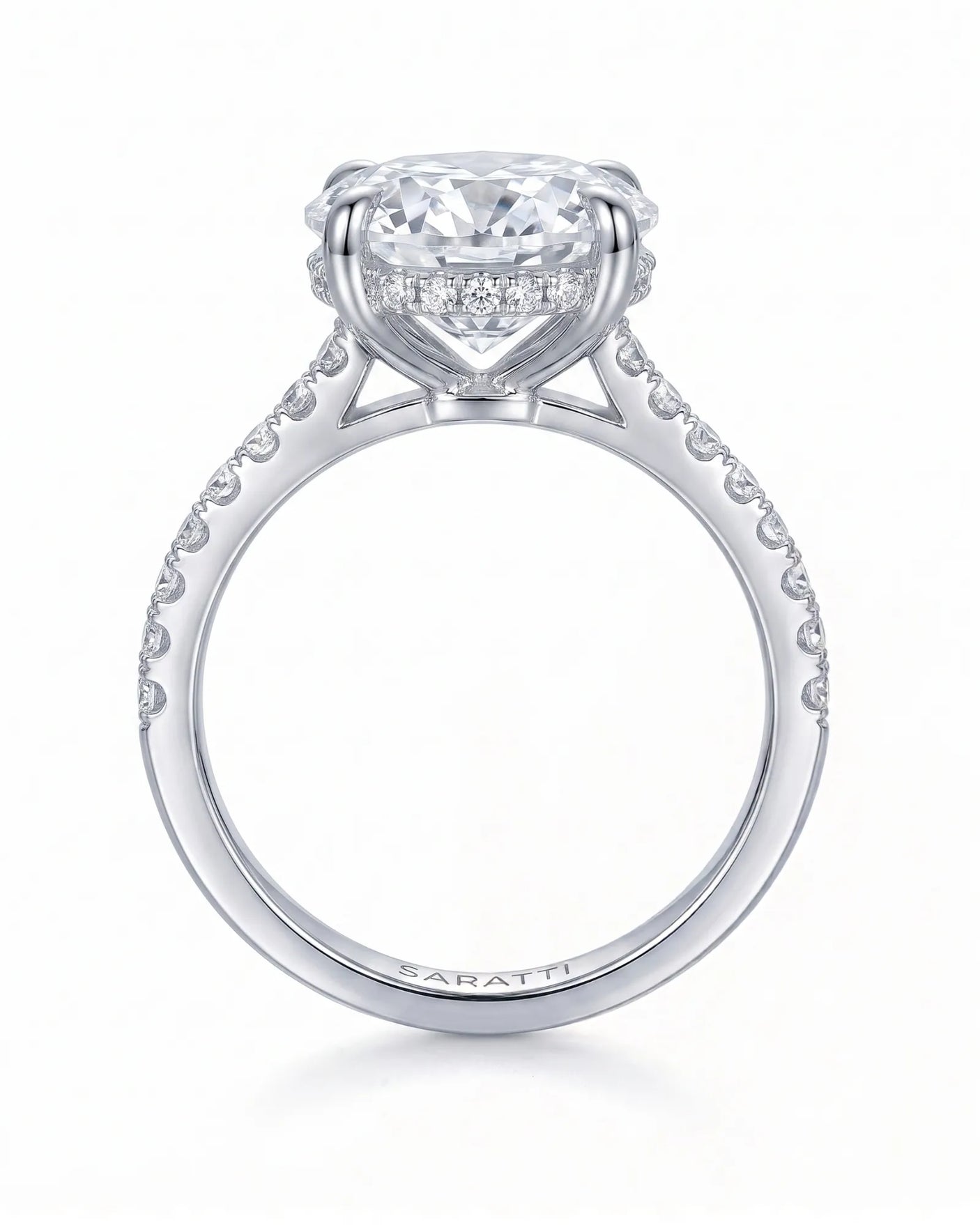 Adriana 1 carat F-colour oval natural diamond hidden halo ring in platinum, side profile showing hidden halo and raised gallery | SARATTI