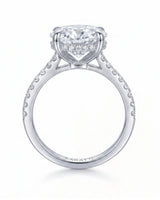 Adriana 1 carat F-colour oval natural diamond hidden halo ring in platinum, side profile showing hidden halo and raised gallery | SARATTI