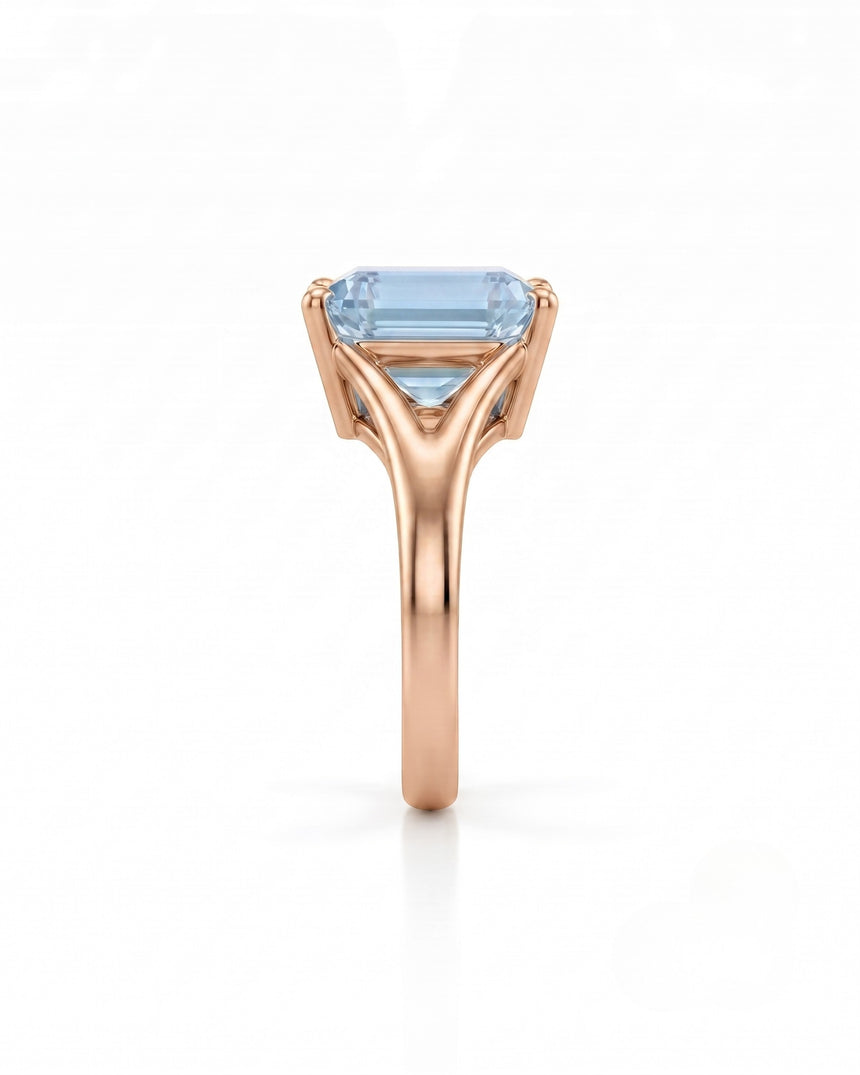AERIA emerald cut Aquamarine split-shank solitaire ring setting in Rose Gold, side profile | SARATTI