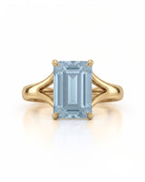 AERIA emerald cut Aquamarine split-shank solitaire ring setting in Yellow Gold, front view | SARATTI