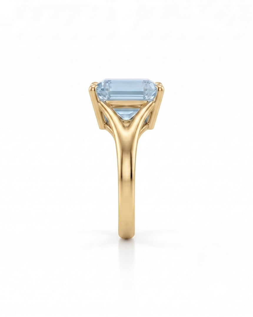 AERIA emerald cut Aquamarine split-shank solitaire ring setting in Yellow Gold, side profile | SARATTI