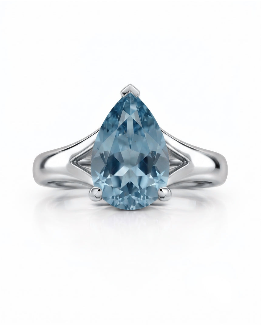 AERIA pear cut Aquamarine split shank solitaire ring setting in Platinum, front view | SARATTI