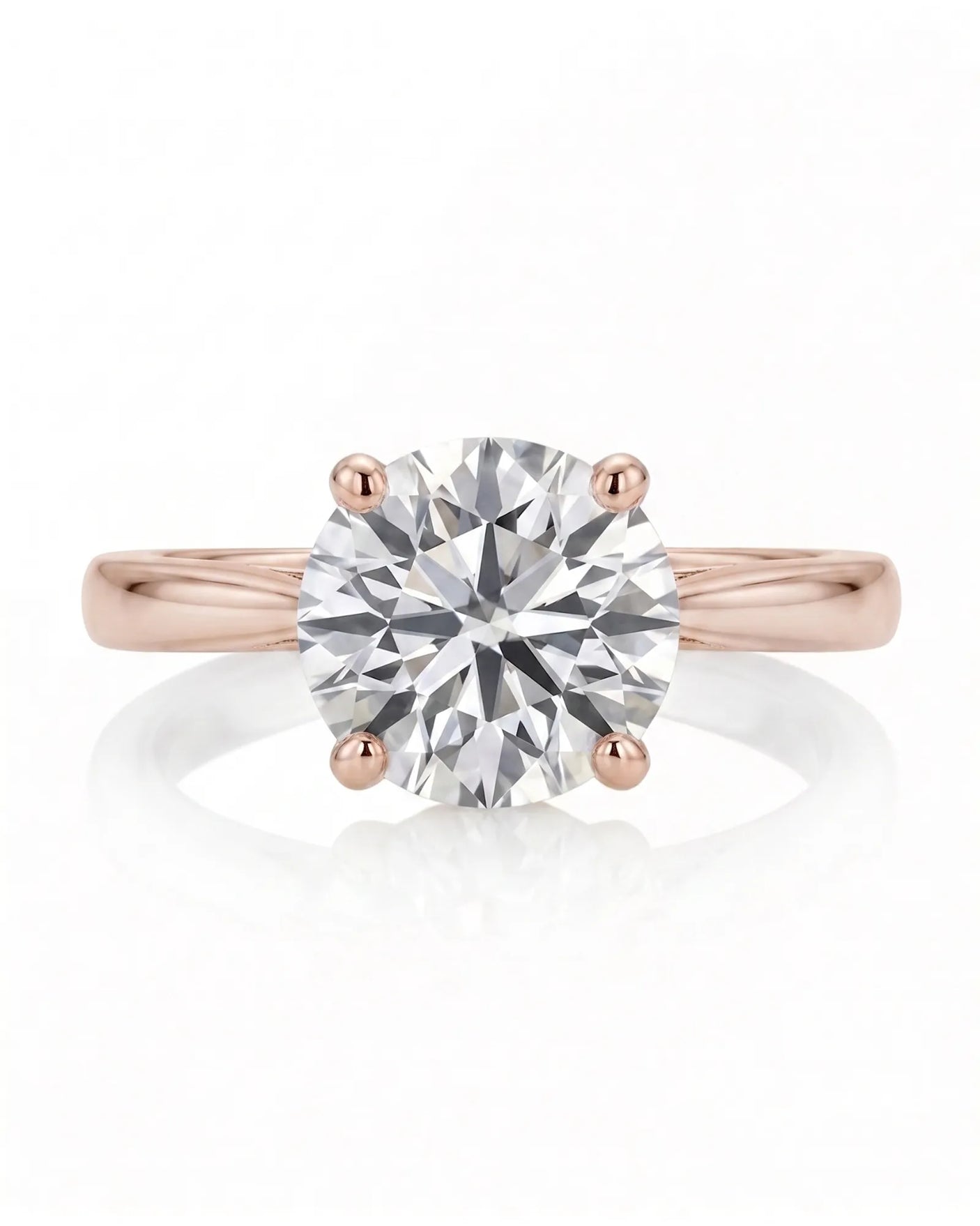 ARIA 1 carat round natural diamond solitaire engagement ring in 18K rose gold, front view of four-prong setting | SARATTI