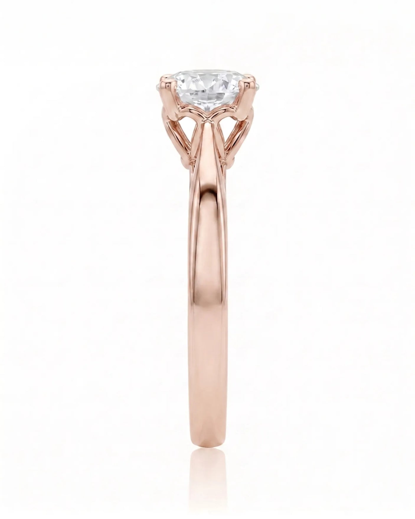 ARIA 1 carat round natural diamond solitaire engagement ring in 18K rose gold, side profile showing elevated open basket | SARATTI