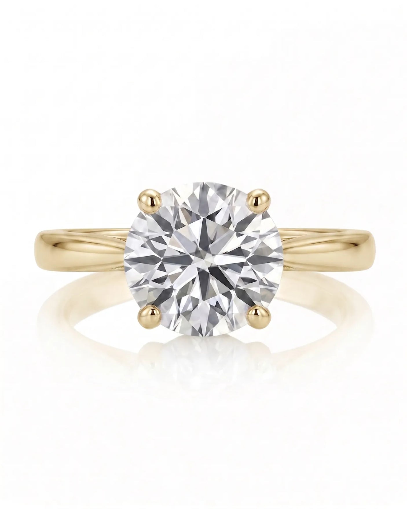 ARIA 1 carat round natural diamond solitaire engagement ring in 18K yellow gold, front view of four-prong setting | SARATTI