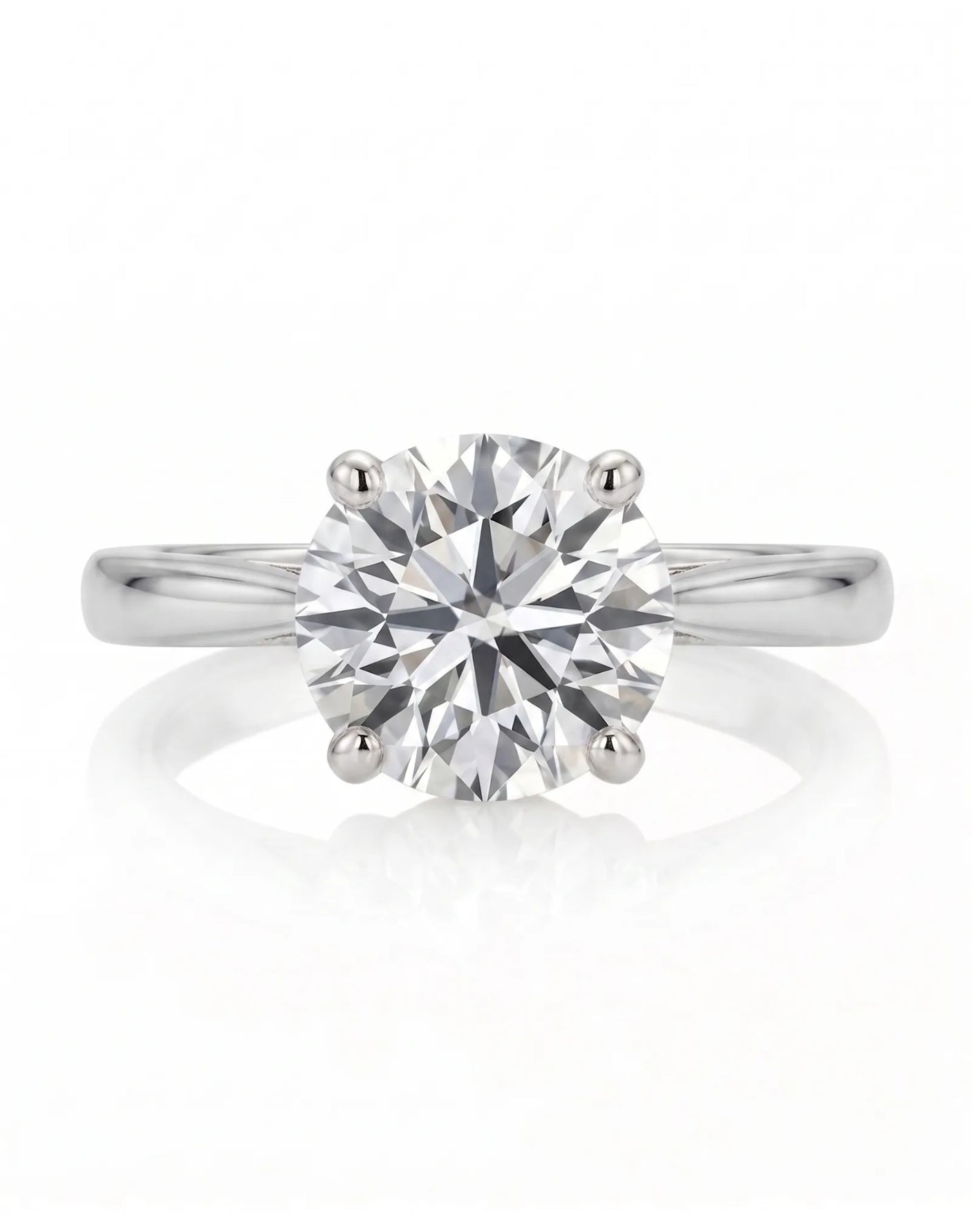ARIA 1 carat round natural diamond solitaire engagement ring in platinum, front view of four-prong setting | SARATTI