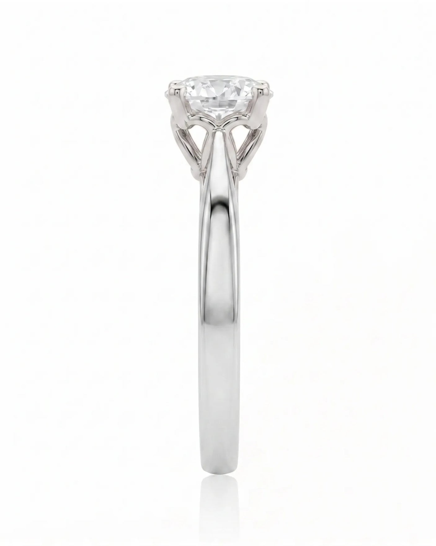 ARIA 1 carat round natural diamond solitaire engagement ring in platinum, side profile showing elevated open basket | SARATTI
