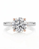 ARIA 1 carat round natural diamond two-tone solitaire engagement ring in 18K white and rose gold, front view of four-prong setting | SARATTI