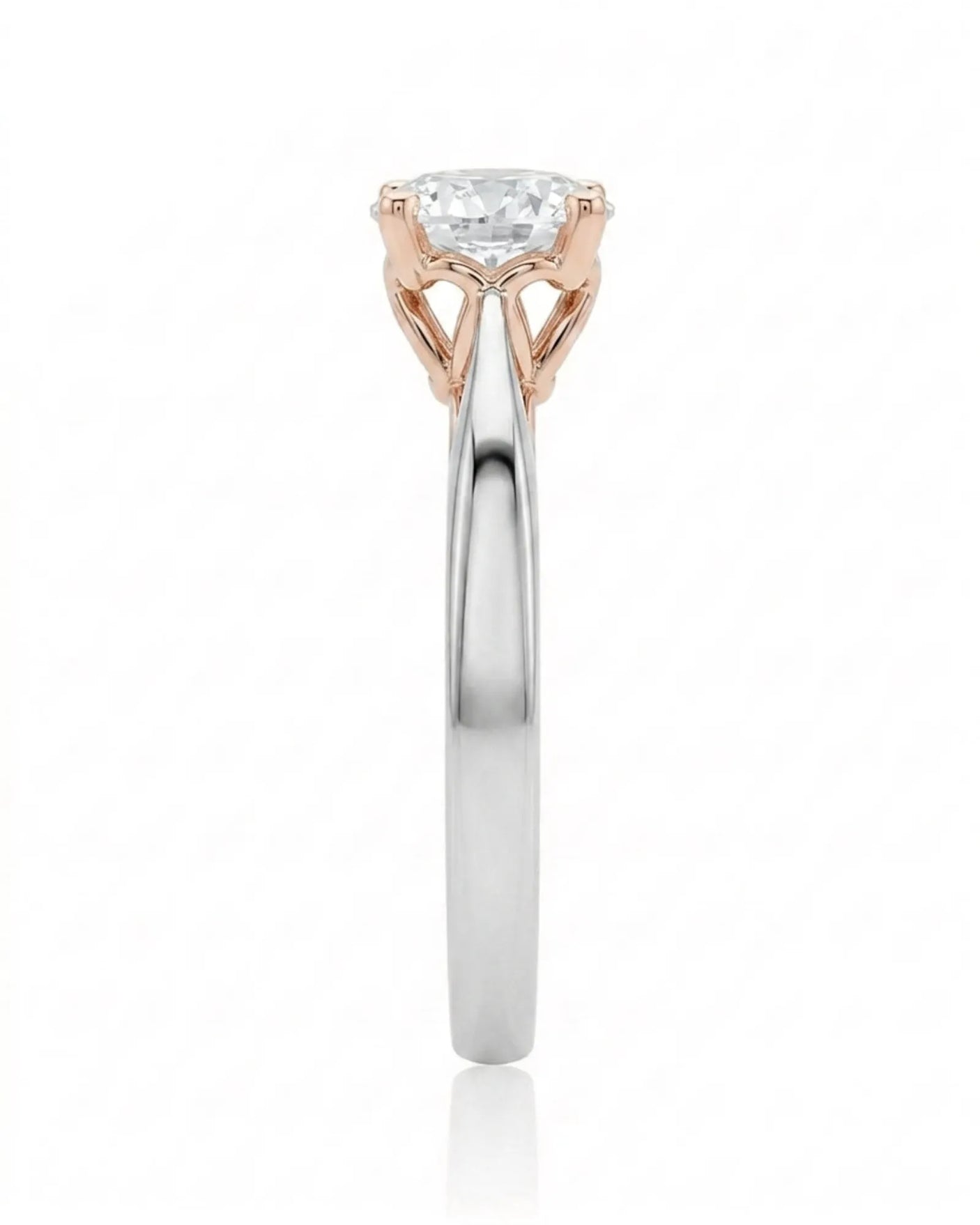 ARIA 1 carat round natural diamond two-tone solitaire engagement ring in 18K white and rose gold, side profile showing elevated open basket | SARATTI