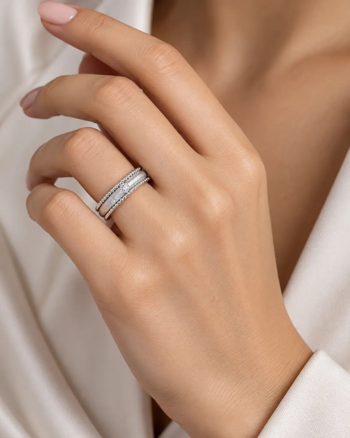 Art Nouveau diamond wedding band worn on hand in platinum | SARATTI