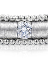 Art Nouveau platinum diamond wedding band with sculpted scrollwork and detailed textured finish | SARATTI
