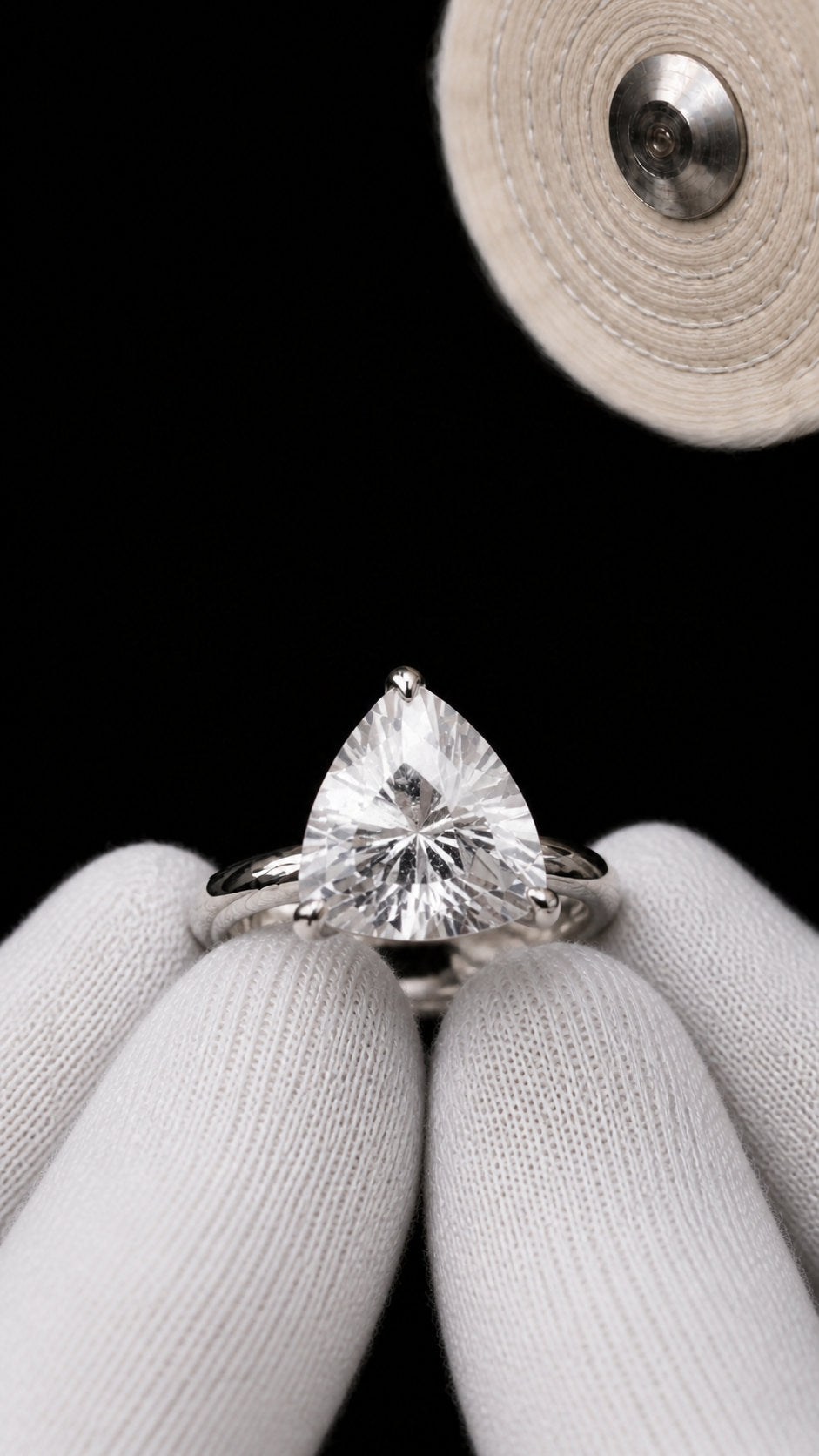 Danburite gemstone hand-set in fine jewellery, claws away from the cleavage | SARATTI