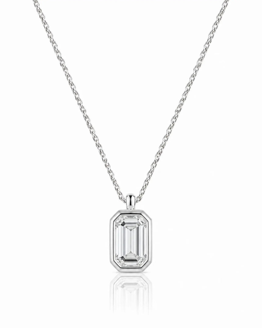 AUREX Emerald Cut bezel necklace setting in white gold | SARATTI