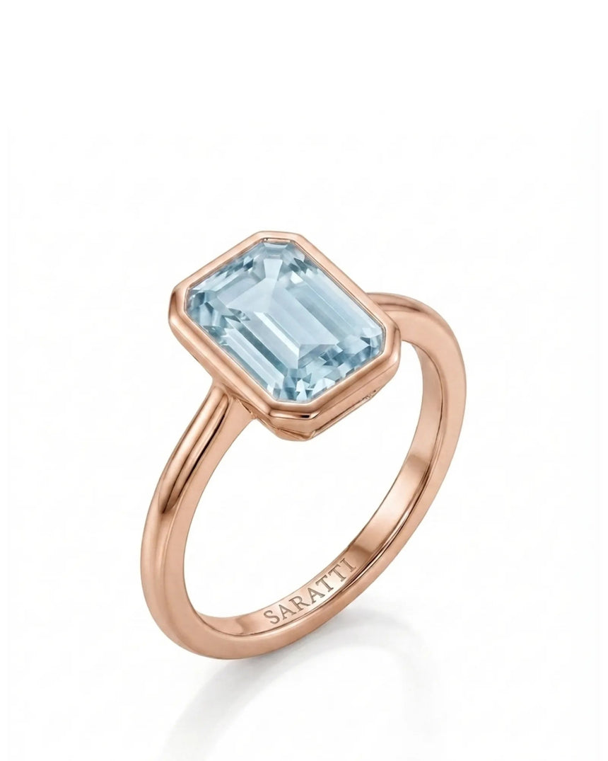 AUREX emerald cut Aquamarine bezel ring setting in Rose Gold, 45-degree view | SARATTI