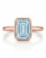 AUREX emerald cut Aquamarine bezel ring setting in Rose Gold, front view | SARATTI