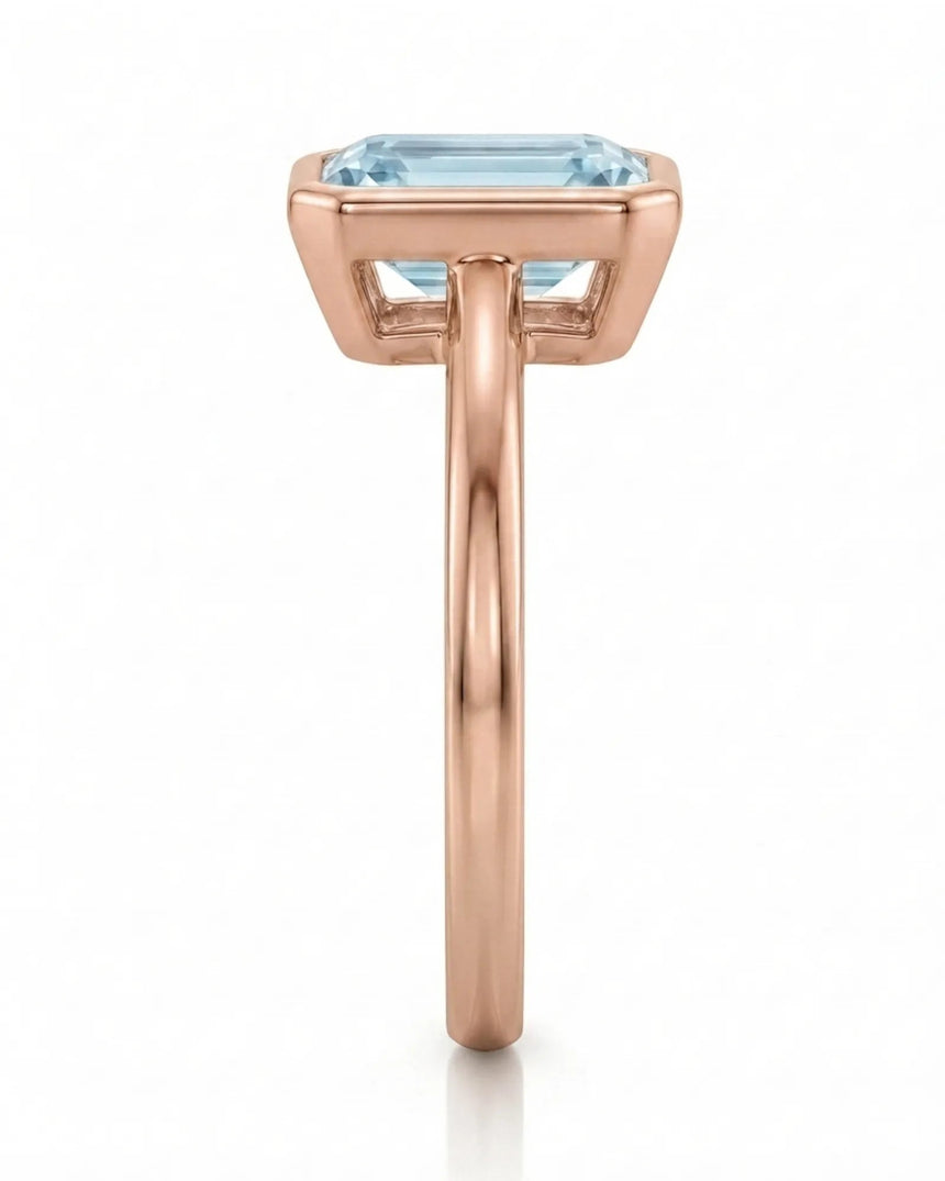 AUREX emerald cut Aquamarine bezel ring setting in Rose Gold, side profile | SARATTI