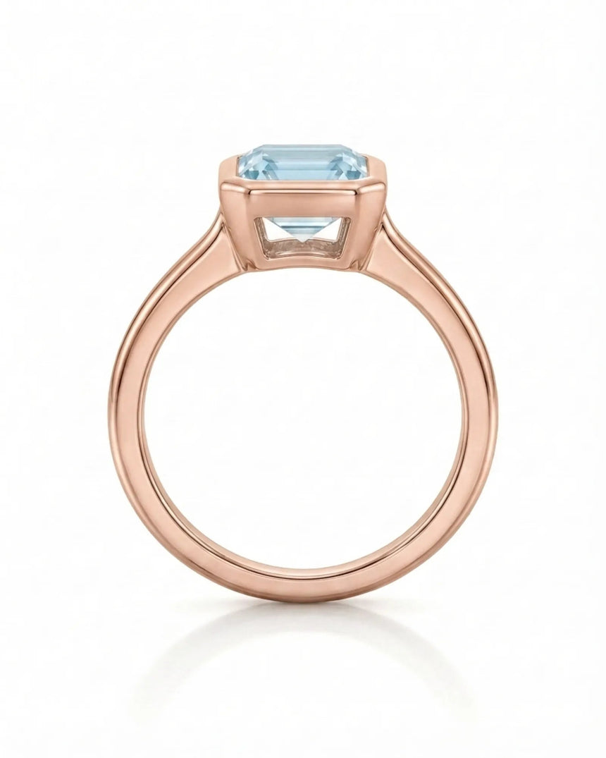 AUREX emerald cut Aquamarine bezel ring setting in Rose Gold, top view | SARATTI