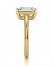 AUREX emerald cut Aquamarine bezel ring setting in Yellow Gold, side profile | SARATTI