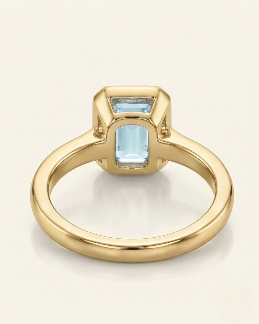 AUREX emerald cut Aquamarine bezel ring setting in Yellow Gold, underside gallery view | SARATTI