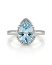 AUREX pear cut Aquamarine bezel solitaire ring setting in Platinum, front view | SARATTI