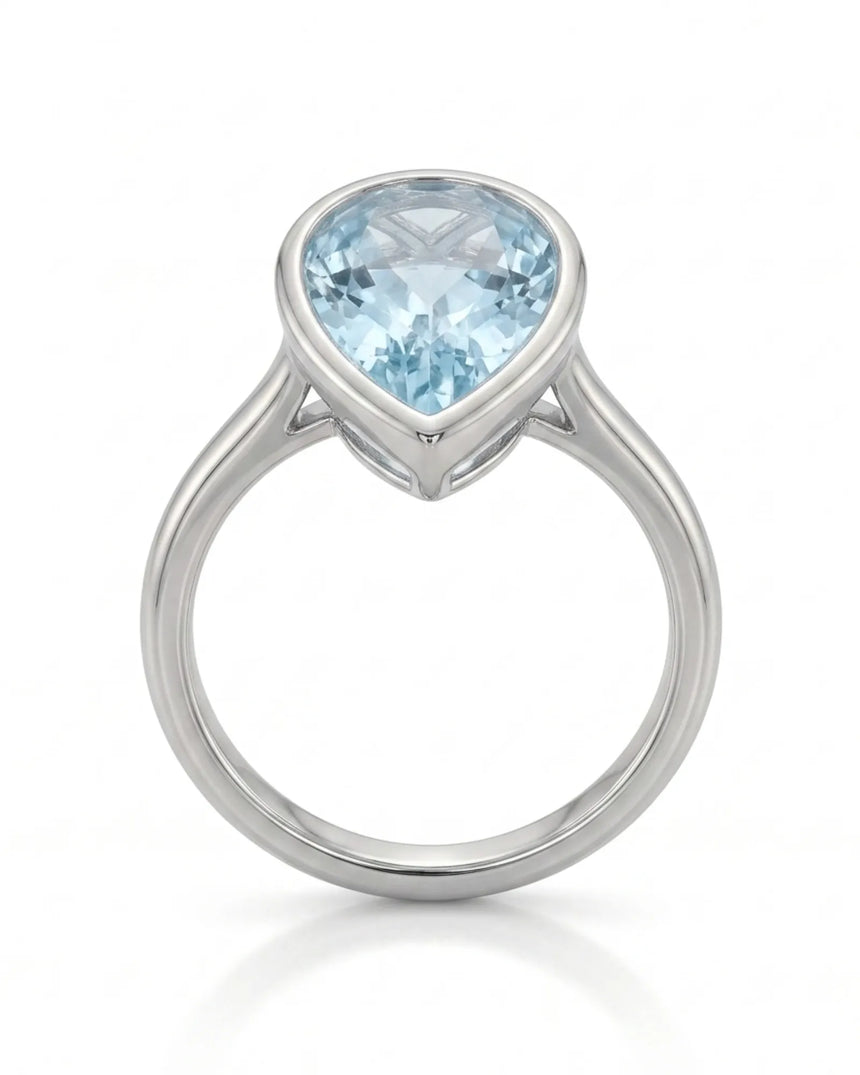 AUREX pear cut Aquamarine bezel solitaire ring setting in Platinum, top view | SARATTI