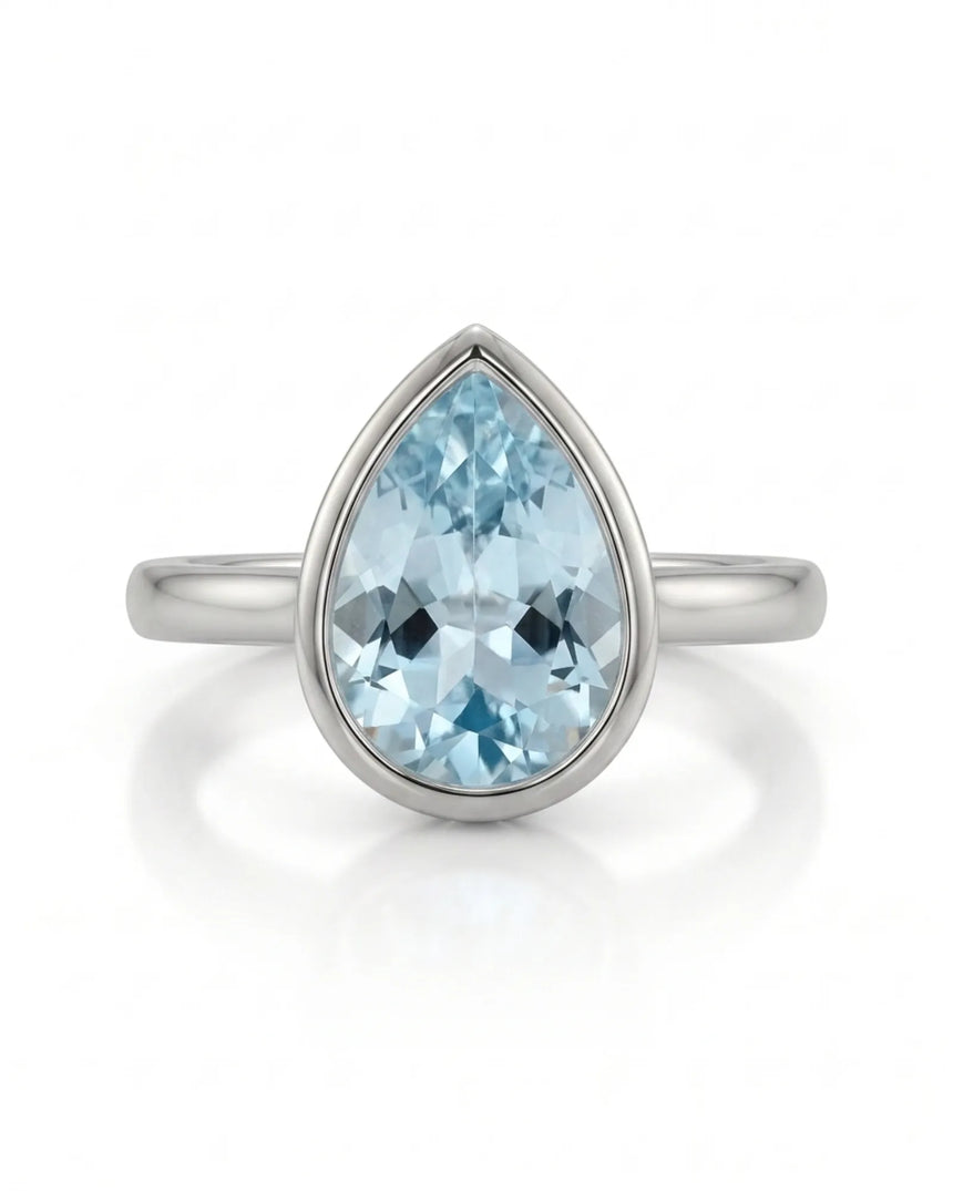 AUREX pear cut Aquamarine bezel solitaire ring setting in White Gold, front view | SARATTI