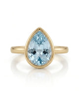 AUREX pear cut Aquamarine bezel solitaire ring setting in Yellow Gold, front view | SARATTI