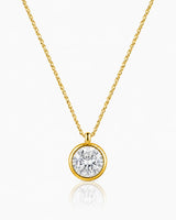 AUREX Round Cut bezel necklace setting in yellow gold | SARATTI