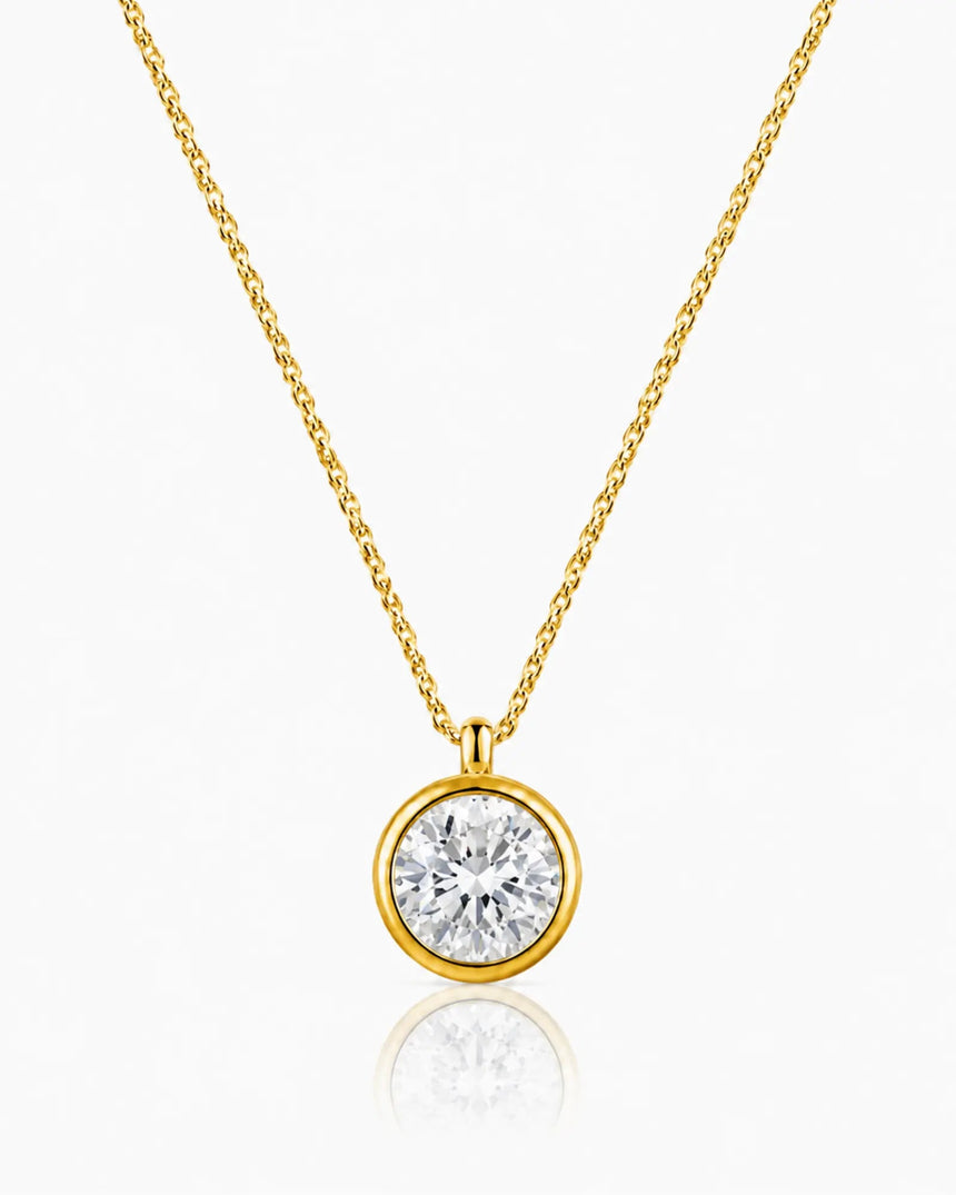 AUREX Round Cut bezel necklace setting in yellow gold | SARATTI