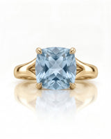 Avenelle cushion cut Aquamarine split-shank ring setting in yellow gold, front view | SARATTI