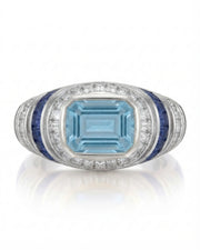 Azzurro Regent emerald-cut Aquamarine cocktail ring setting in Platinum, front view with baguette diamond frame and blue sapphire channels | SARATTI