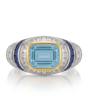 Azzurro Regent emerald-cut Aquamarine cocktail ring setting in yellow and white gold, front view with baguette diamond frame and blue sapphire channels | SARATTI