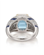Azzurro Regent emerald-cut Aquamarine cocktail ring setting in yellow and white gold, underside showing open geometric gallery and broad shank | SARATTI