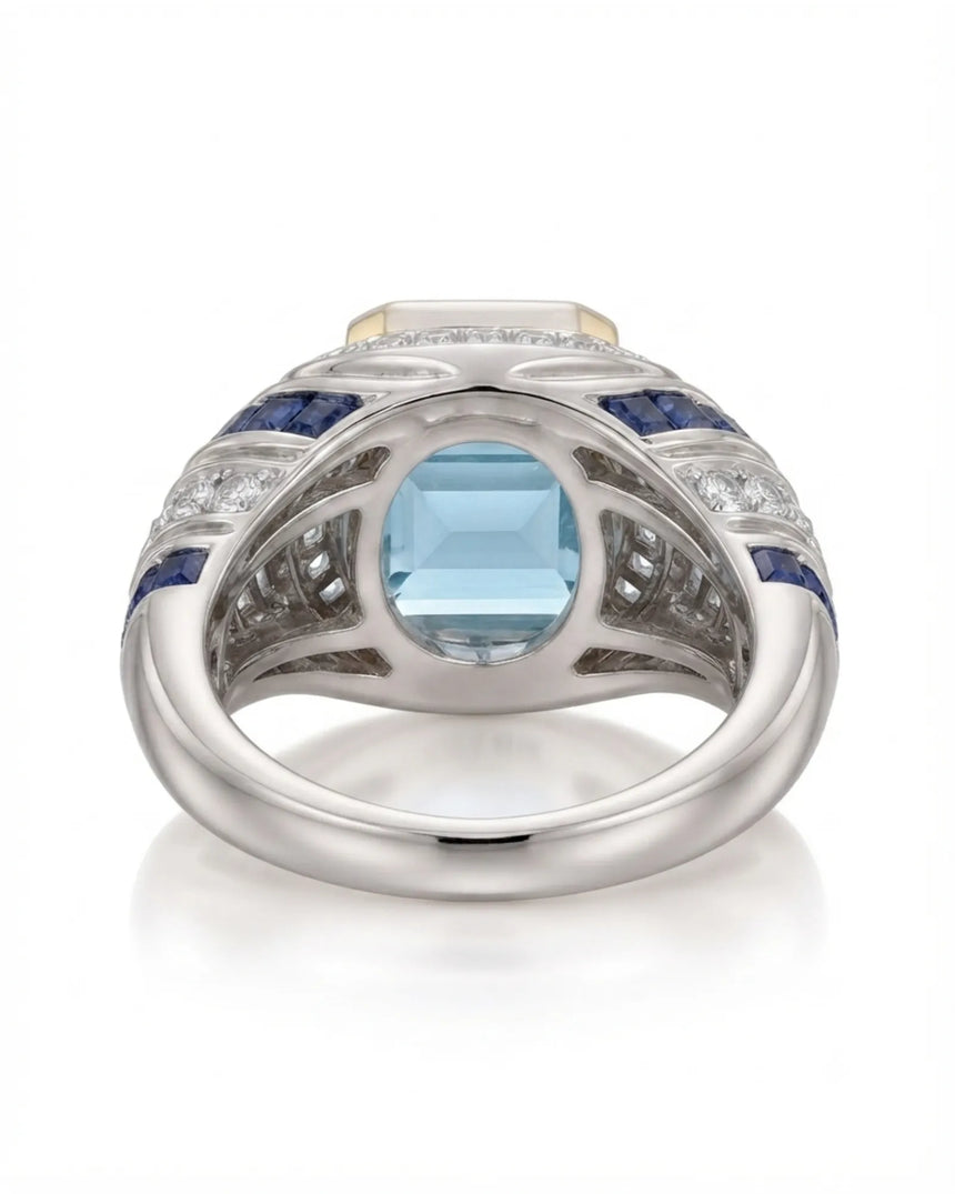 Azzurro Regent emerald-cut Aquamarine cocktail ring setting in yellow and white gold, underside showing open geometric gallery and broad shank | SARATTI