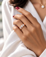 Baguette eternity band in 18K rose gold worn on hand | SARATTI