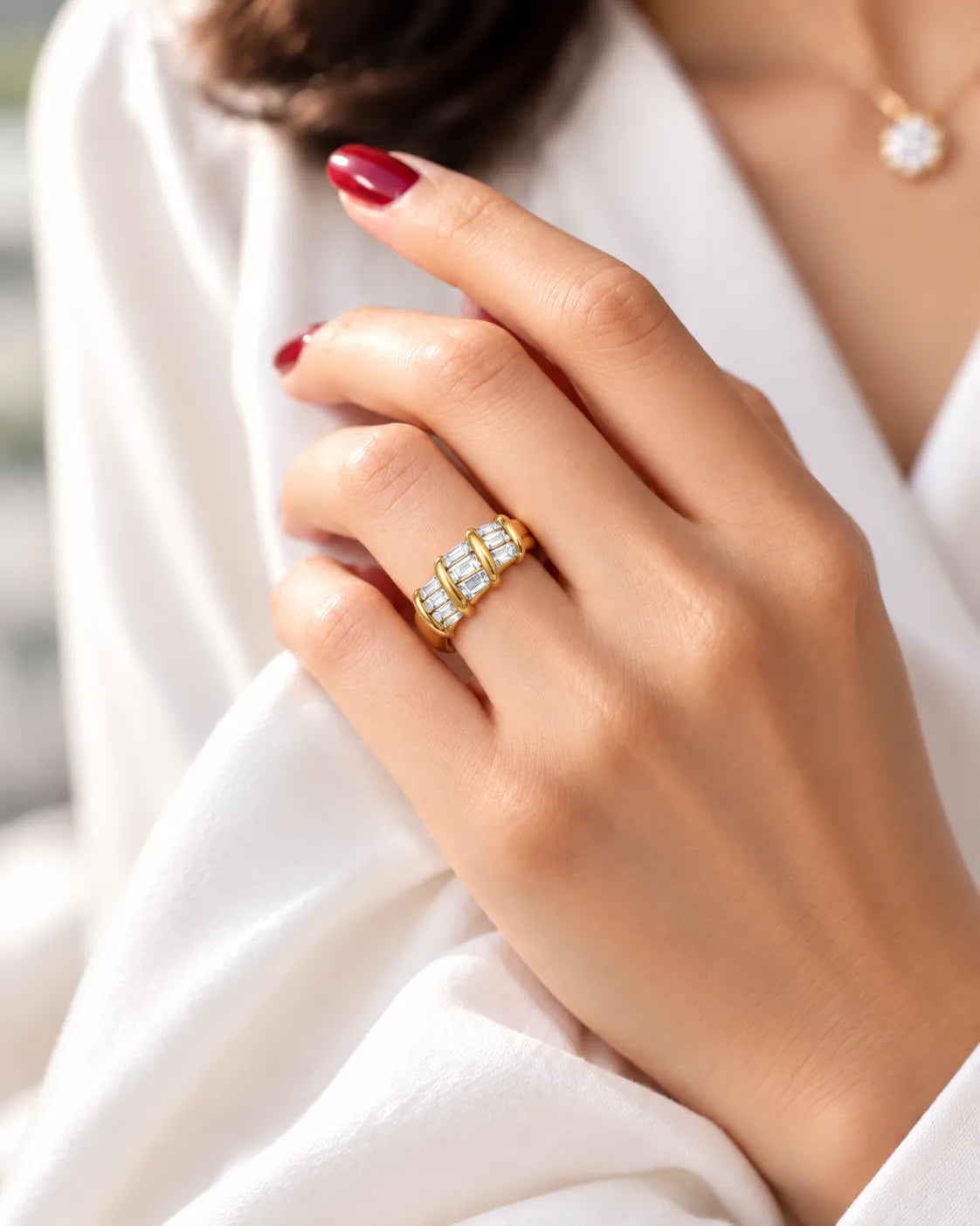 Baguette eternity band in 18K yellow gold worn on hand | SARATTI