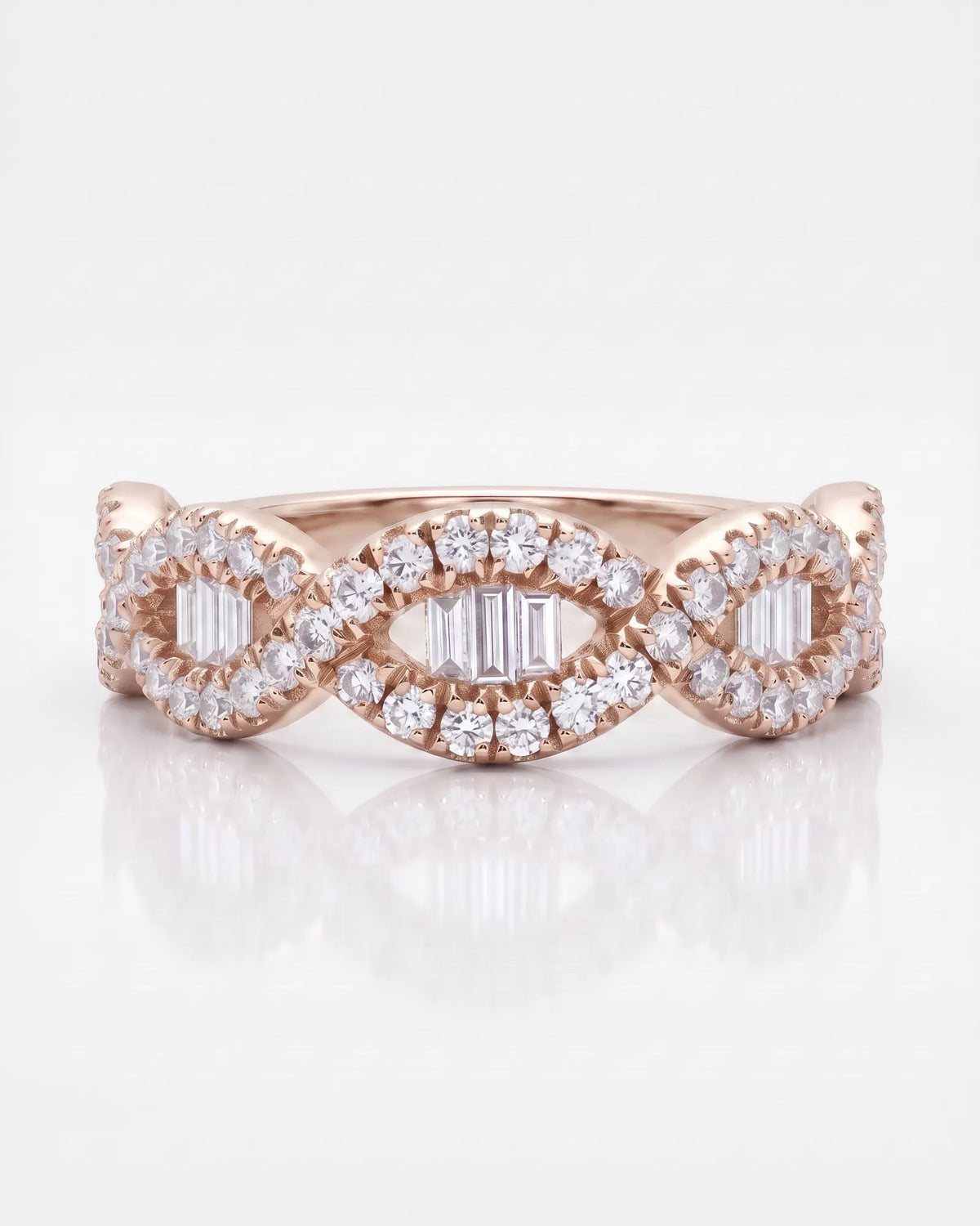 Rose gold baguette and round diamond wedding band showing the flowing half eternity design | SARATTI