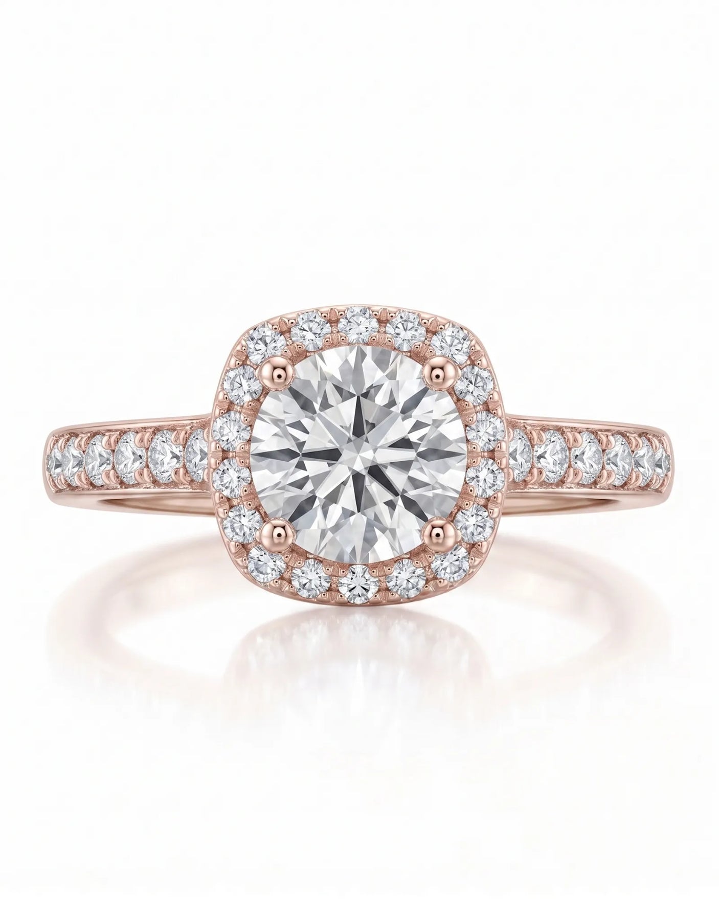 BEA 0.50 carat round natural diamond halo engagement ring in 18K rose gold, front view of cushion halo and pavé shoulders | SARATTI