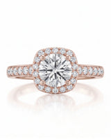 BEA 0.50 carat round natural diamond halo engagement ring in 18K rose gold, front view of cushion halo and pavé shoulders | SARATTI