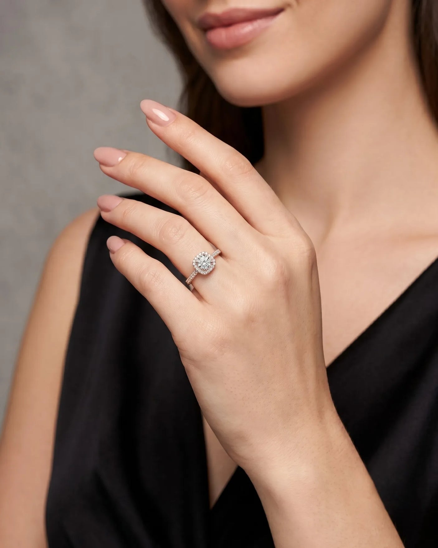 BEA 0.50 carat round natural diamond halo engagement ring in 18K rose gold, worn on hand | SARATTI
