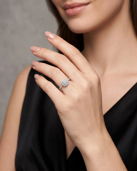 BEA 0.50 carat round natural diamond halo engagement ring in 18K white gold, worn on hand | SARATTI