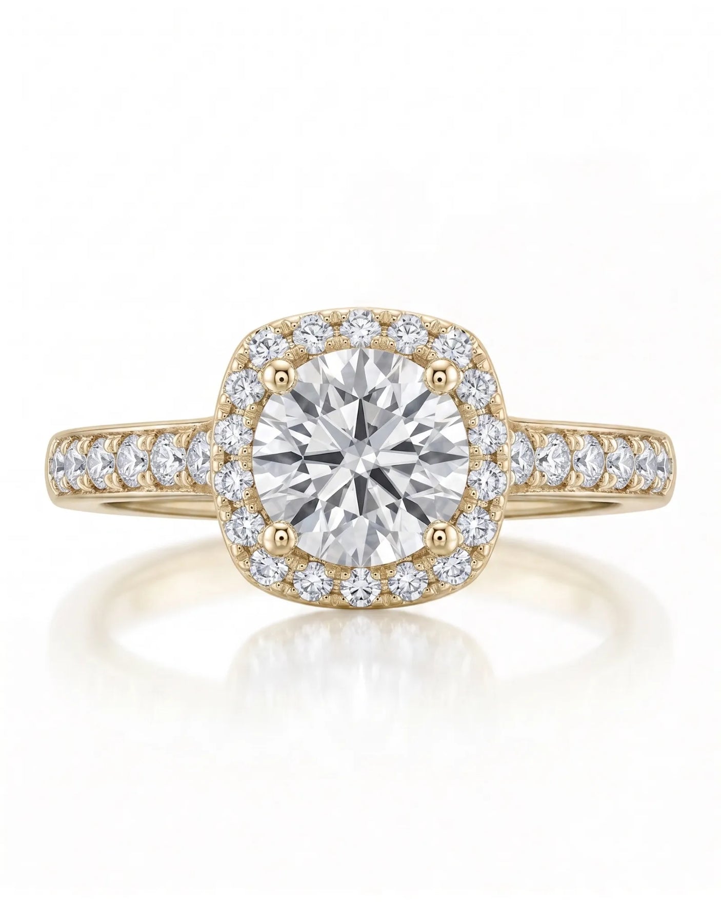 BEA 0.50 carat round natural diamond halo engagement ring in 18K yellow gold, front view of cushion halo and pavé shoulders | SARATTI