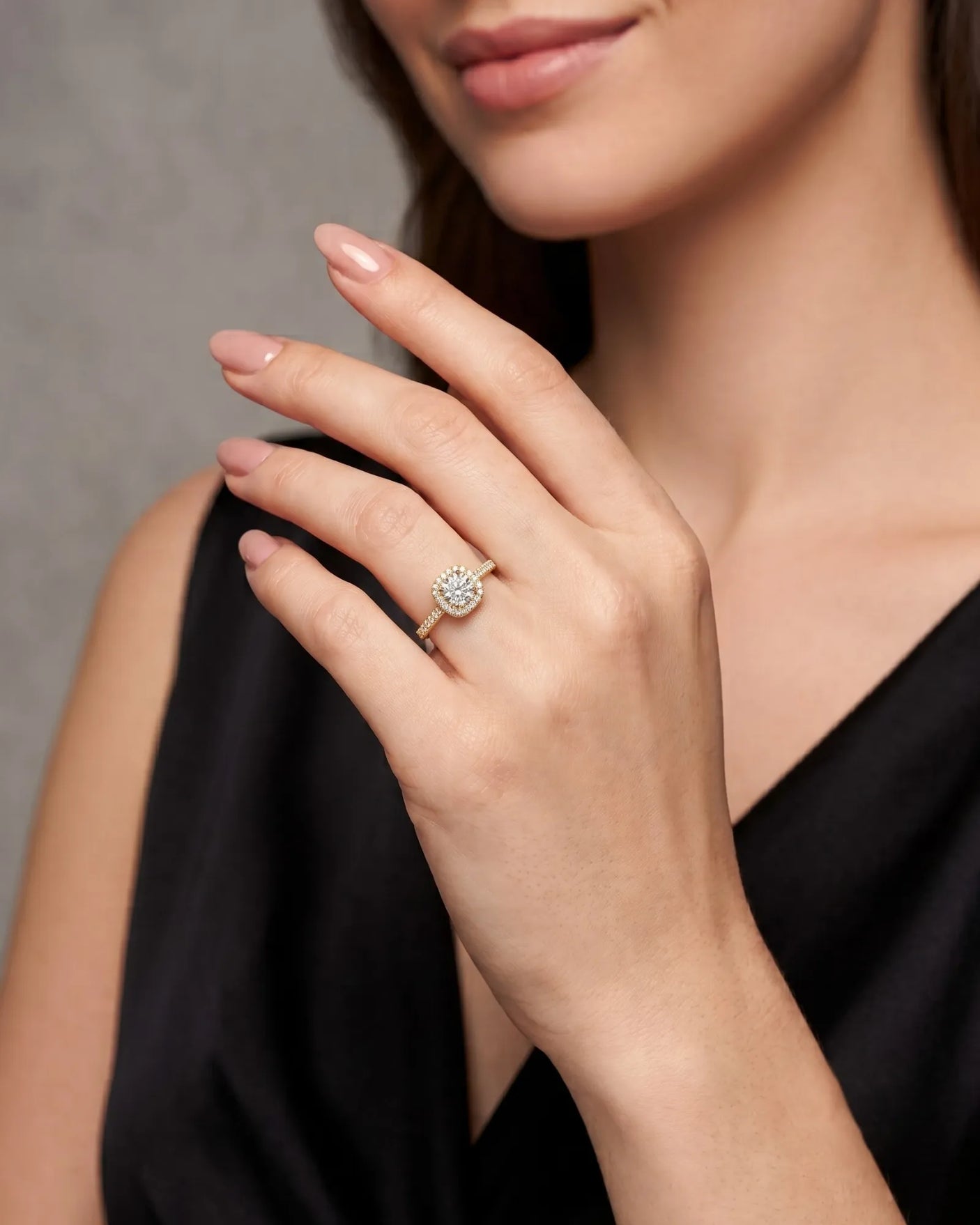 BEA 0.50 carat round natural diamond halo engagement ring in 18K yellow gold, worn on hand | SARATTI