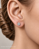 1.00 ct. tw. lab-grown round diamond full-bezel studs in 14K white gold on fair skin | SARATTI