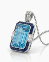Bleu Meridian emerald-cut Aquamarine sapphire necklace setting in white gold, angled view with baguette diamond side accents | SARATTI
